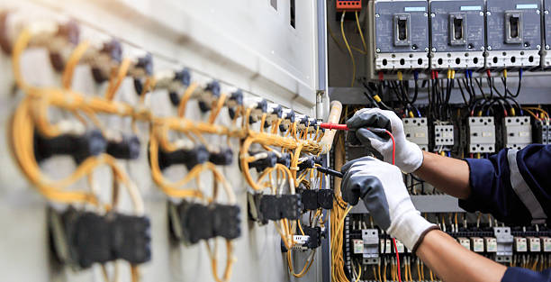 Professional Electrician technician working in Dewey, OK